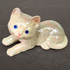 Vintage ceramic kitty with irridecent glaze and blue crystal eyes